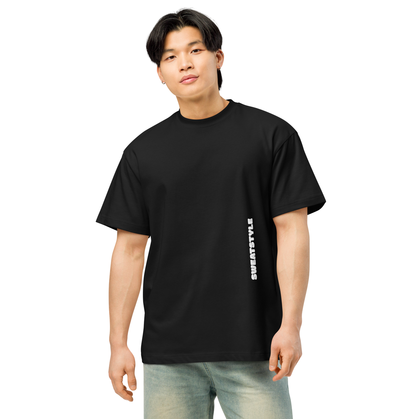 Person wearing a black t-shirt with a brand logo 