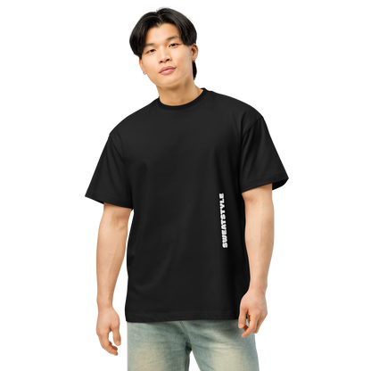Person wearing a black t-shirt with a brand logo 